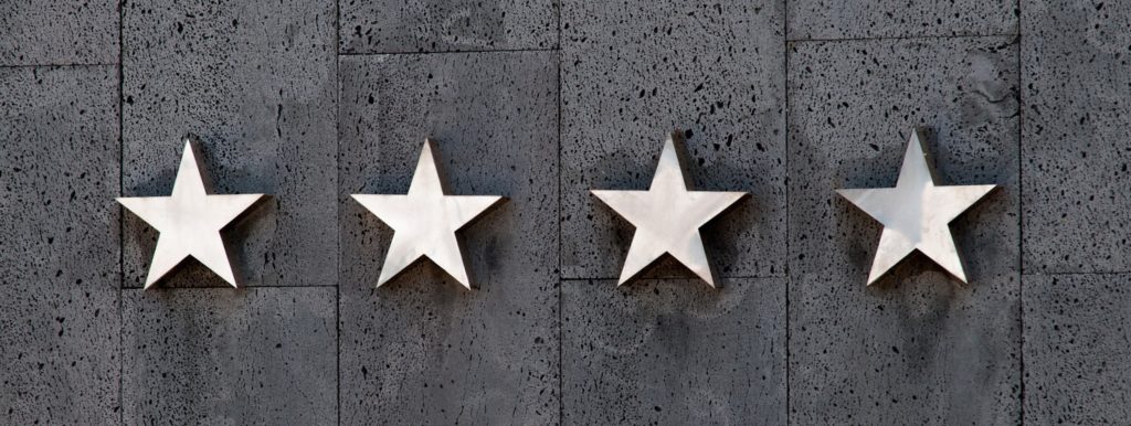 Review Stars on the Side of a Property