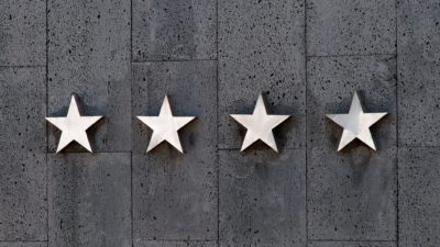 Review Stars on the Side of a Property