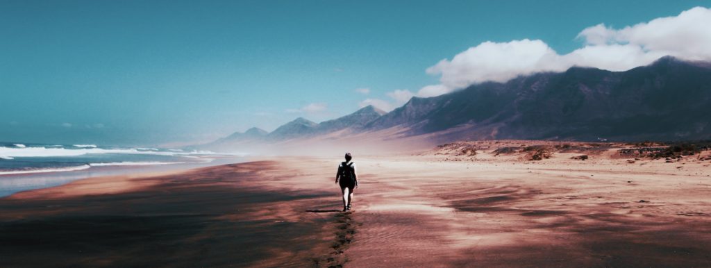 Person Walking in the Desert